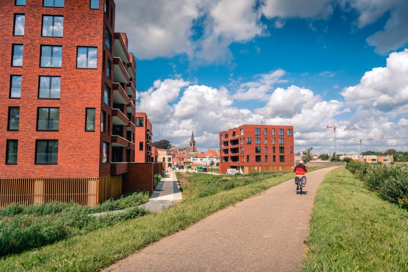 Het zicht op De Boterton in Lier vanop de oever van de Nete | DCA Bouw Het zicht op De Boterton in Lier vanop de oever van de Nete | DCA Bouw