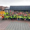 Fluohesjes voor kinderen van school op werf in Puurs