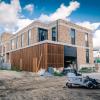 Een bijna afgewerkt gebouw van De Boterton in Lier | DCA Bouw