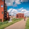 Het zicht op De Boterton in Lier vanop de oever van de Nete | DCA Bouw