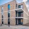 Een bijna afgewerkt gebouw van De Boterton in Lier | DCA Bouw